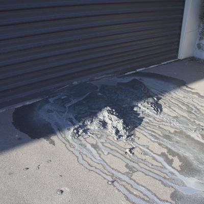 This mud was coming out of the ground outside someones garage.