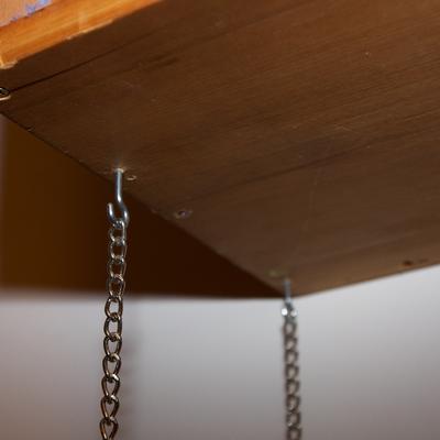 Suspended Shelves Since the bottom of the w is made of soft rope instead of a hard chain i would suspect that it is for soft people to grab onto. suspended shelves