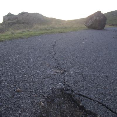 The road was almost demolished by a humongous rock bouncing down the valley.